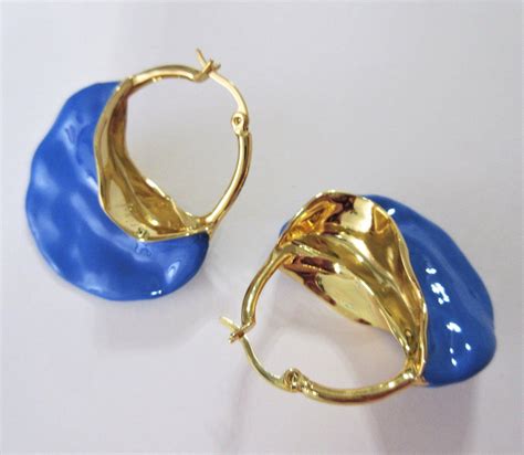 celine blue enamel earrings|authentic Celine earrings.